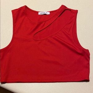 Bright red, cropped tank top with shoulder slit!
